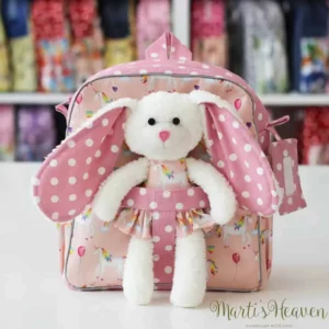 детска раница в поставка и играчка зайче в десен еднорози и розово